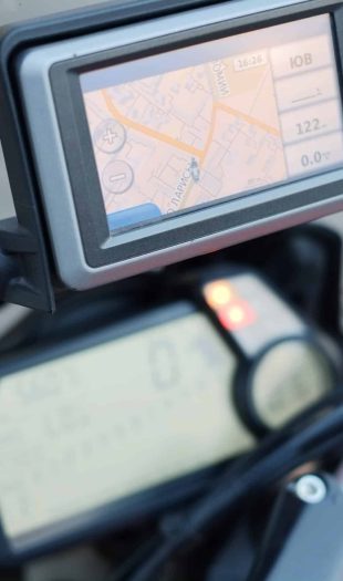 Motorcycle,Travel,Gps,Navigation,On,The,Handlebars,Of,The,Red Motorcycle,Travel,Gps,Navigation,On,The,Handlebars,Of,The,Red